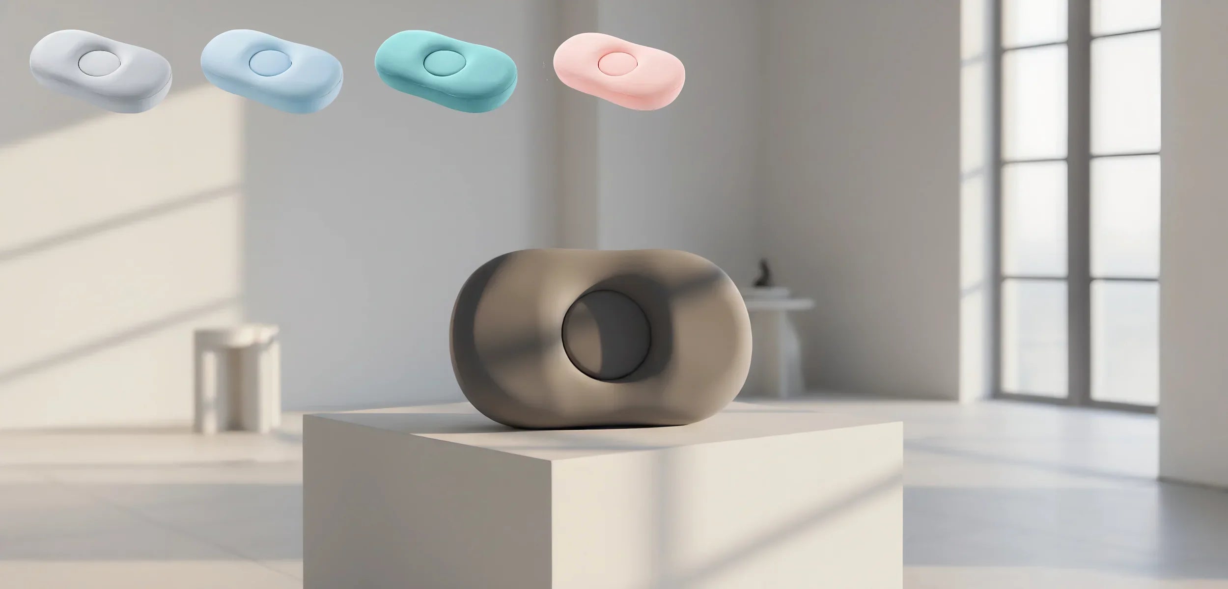 Modern ergonomic hot desk cushion in gray on a white pedestal in bright room with windows